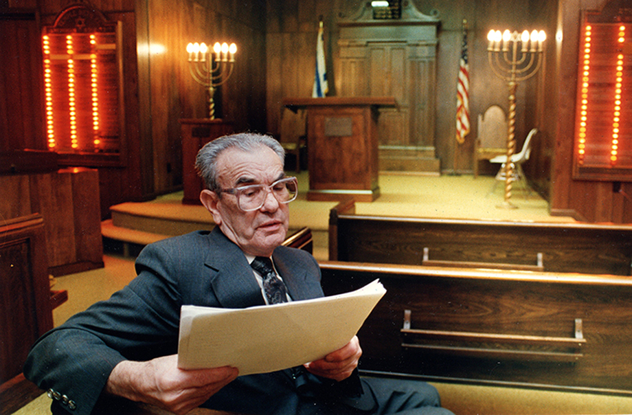 Beckley resident Max Lewin practices reading the names of select Holocaust victims during 
Beckley's first Holocaust Day of Remembrace ceremony on April 14, 1991